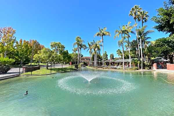 Manhattan Village lake and water fountain